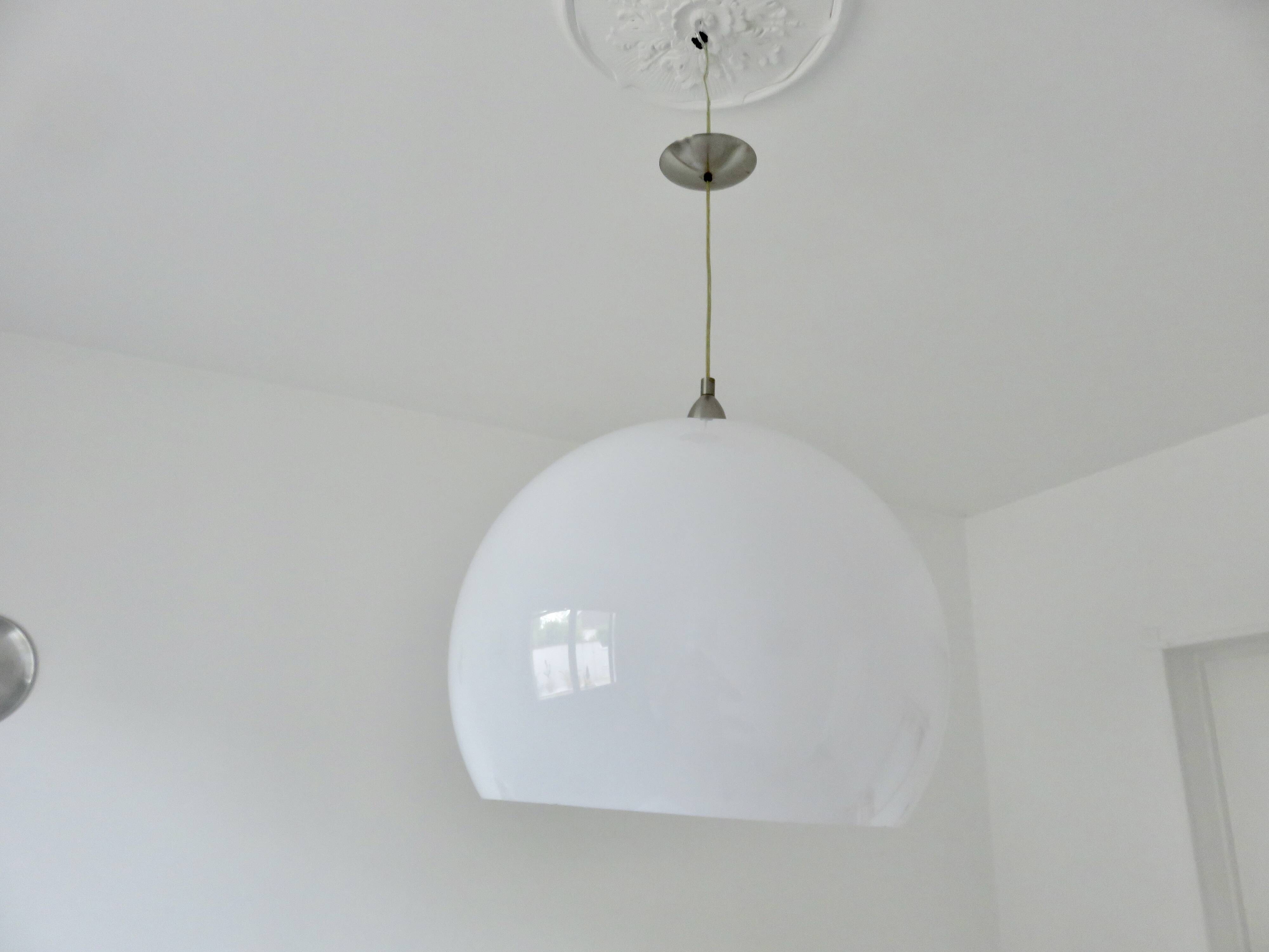 Large spherical suspension in perspex from the 1990s.