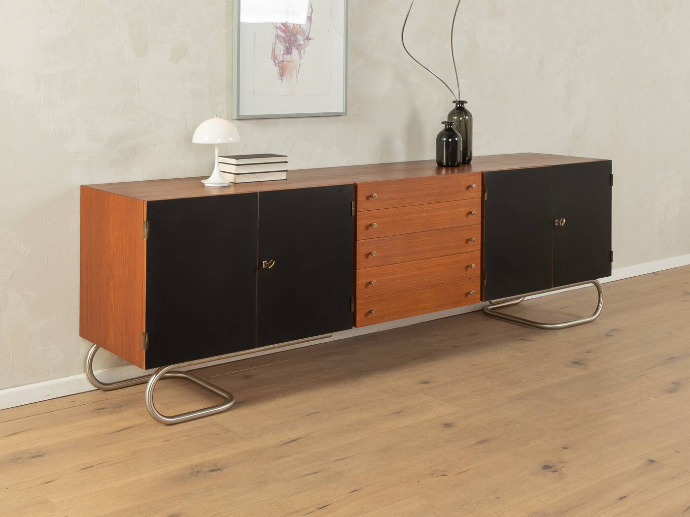 Classic sideboard from the 1960s, teak veneer, black doors, Bauhaus stainless steel feet