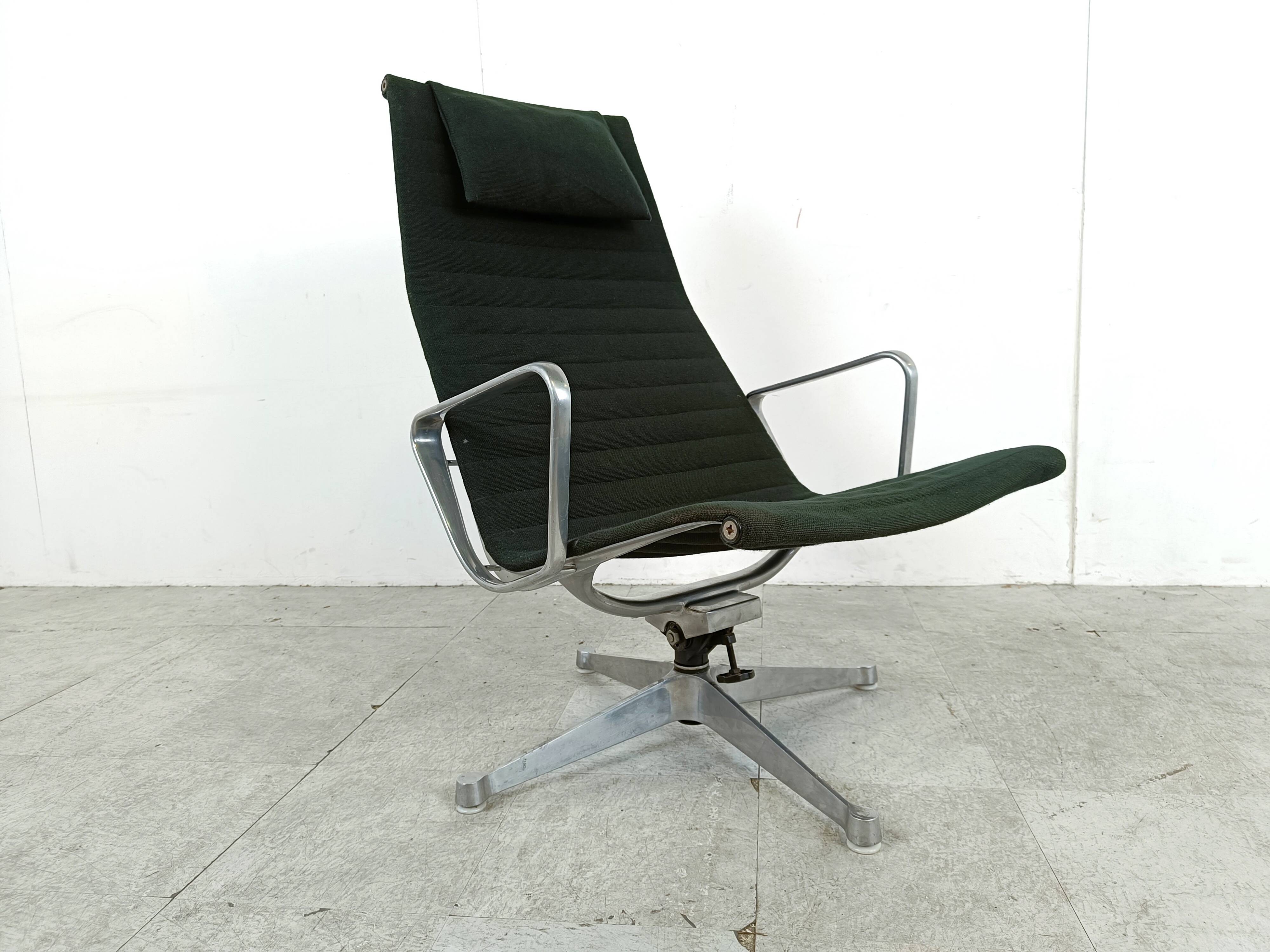 Charles & Ray Eames EA124 Lounge chair in black fabric, 1970s
