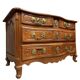 Commode galbée époque Louis XV en noyer et bronzes dorés époque XVIIIeme