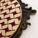 Gilded bronze mirror with angels and scrolls