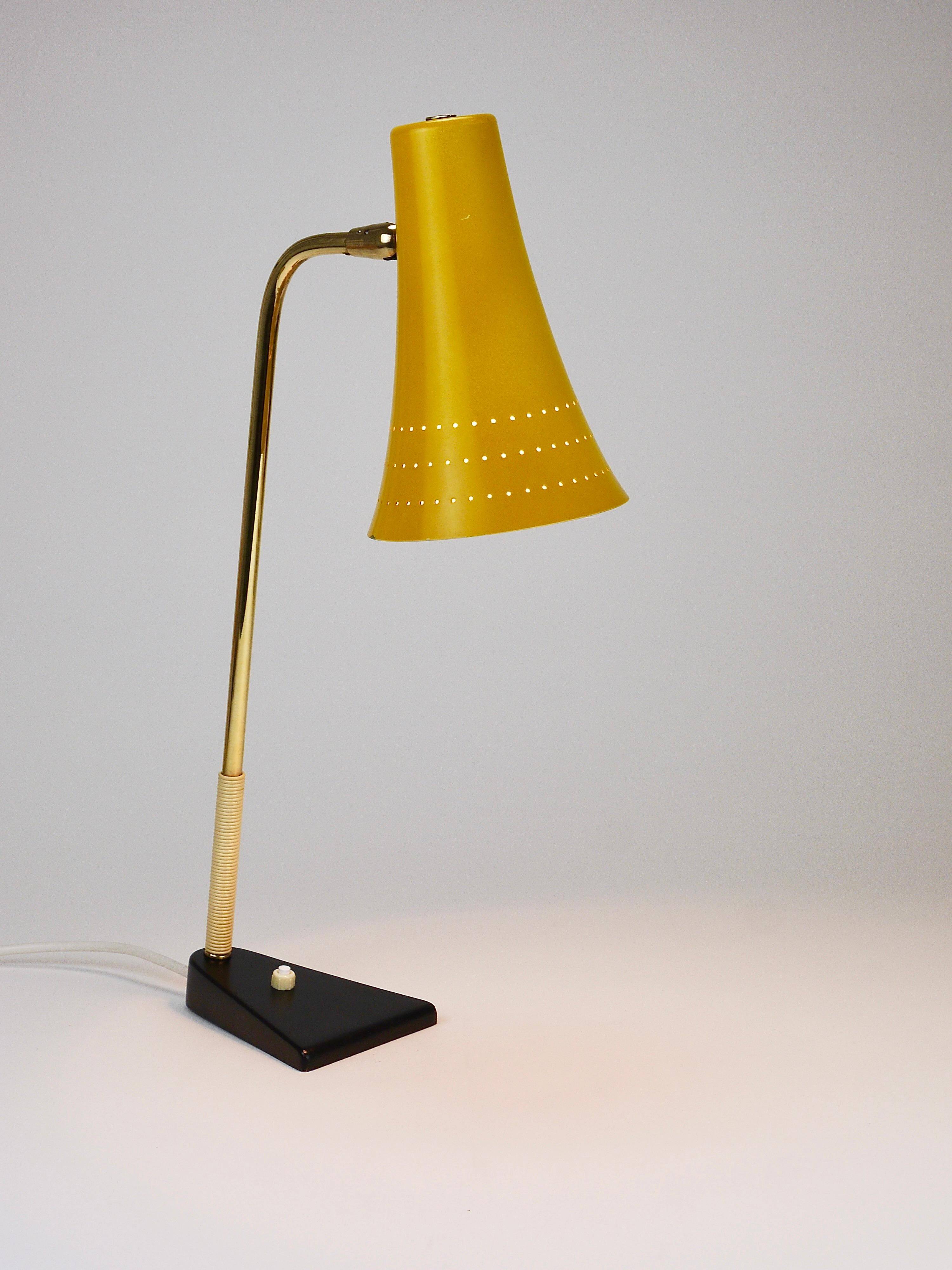 Yellow desk, table or accent lamp by J.T. Kalmar, brass and iron, Vienna, Austria, 1950s.