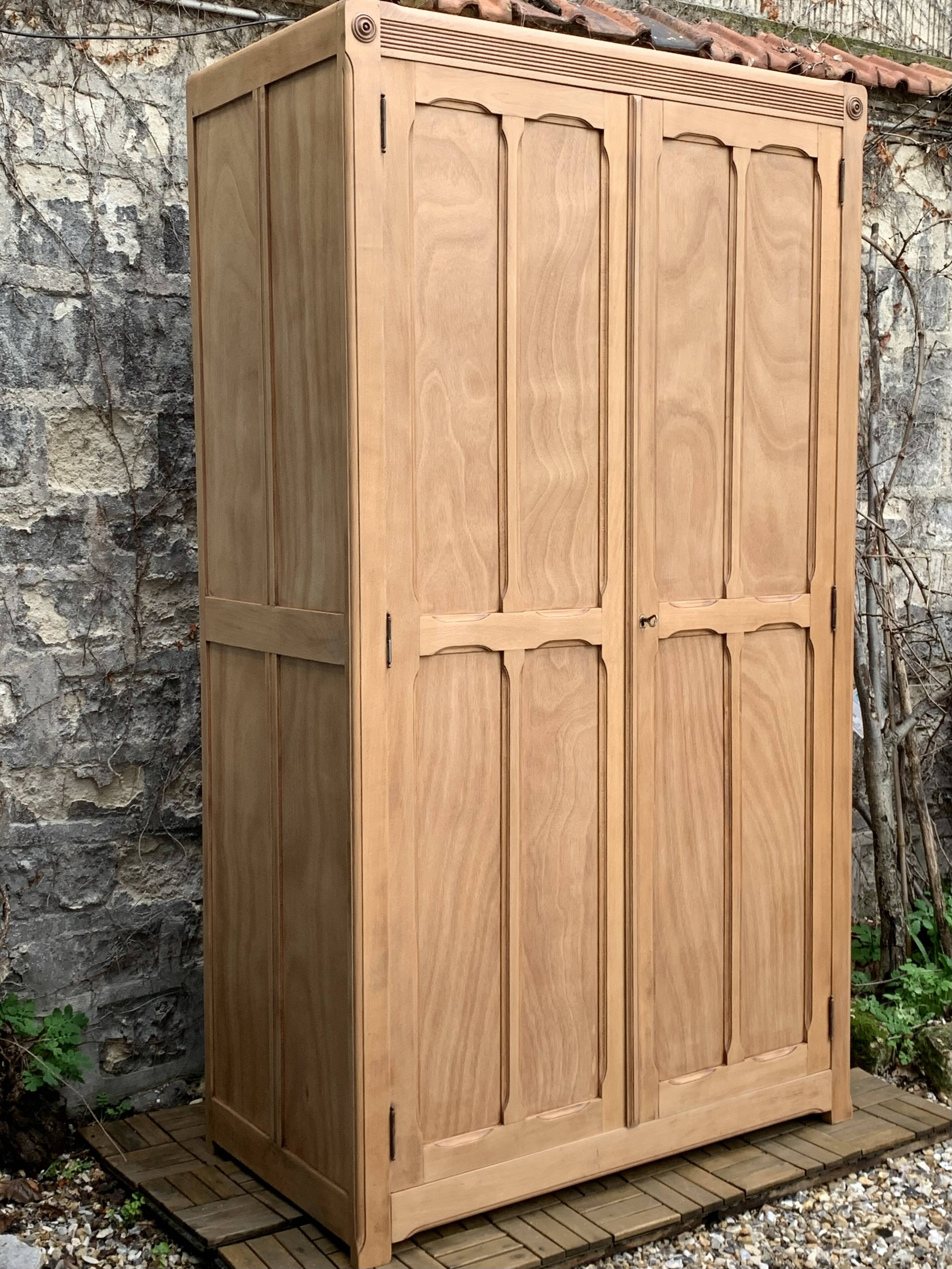 Parisian paneled cabinet in raw wood, 1940