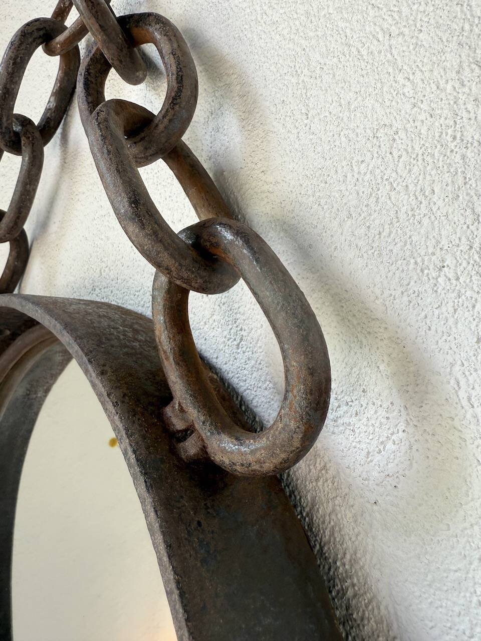 Brutalist mirror with metal chain from the 50s