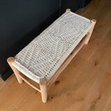 Handcrafted bench in woven raw wood and ecru cotton