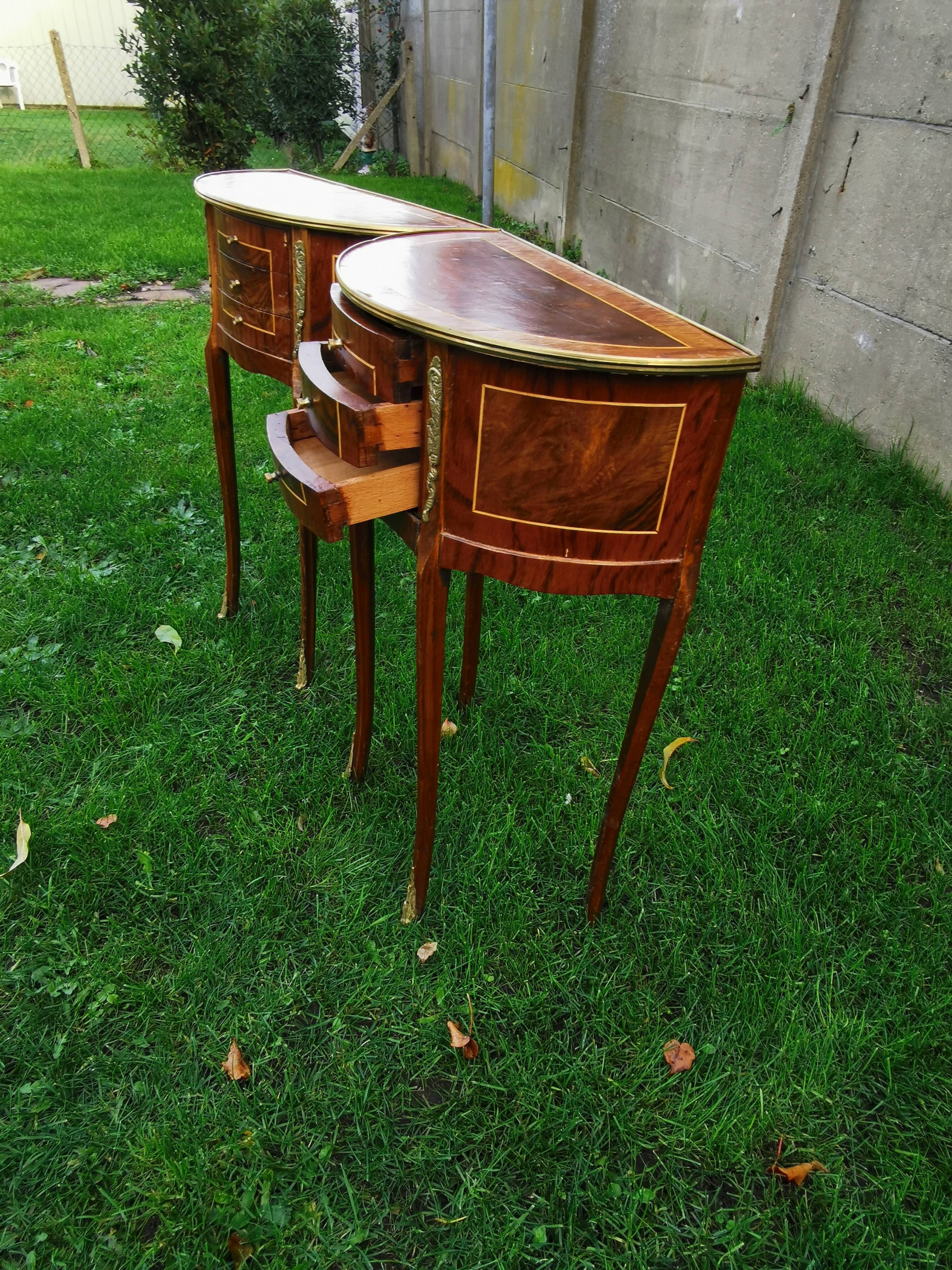 half-moon bedside pair in marquetry, bronze ornaments