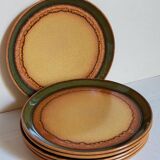 Six vintage stoneware plates with green net