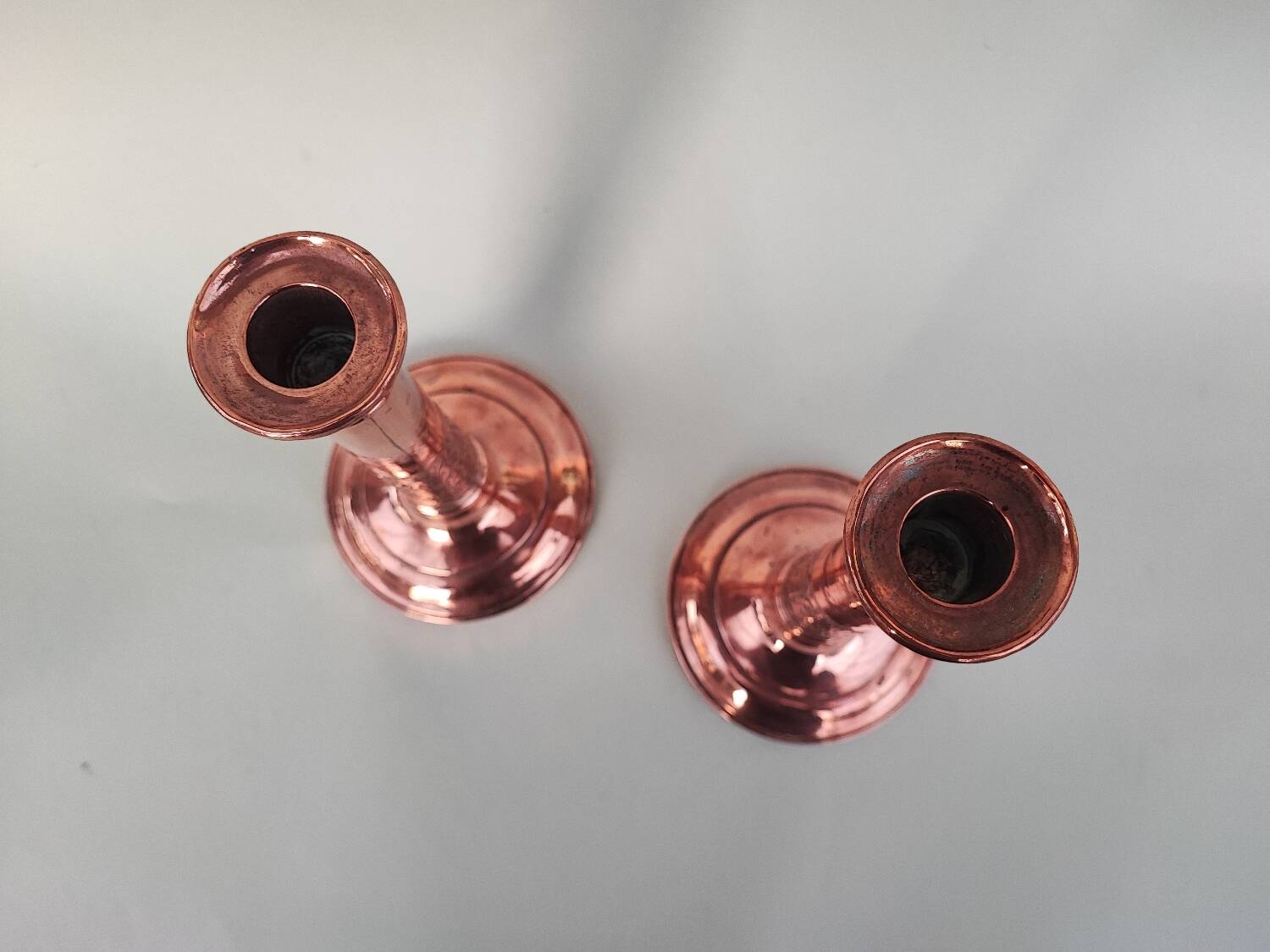 Pair of copper candlesticks