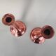 Pair of copper candlesticks