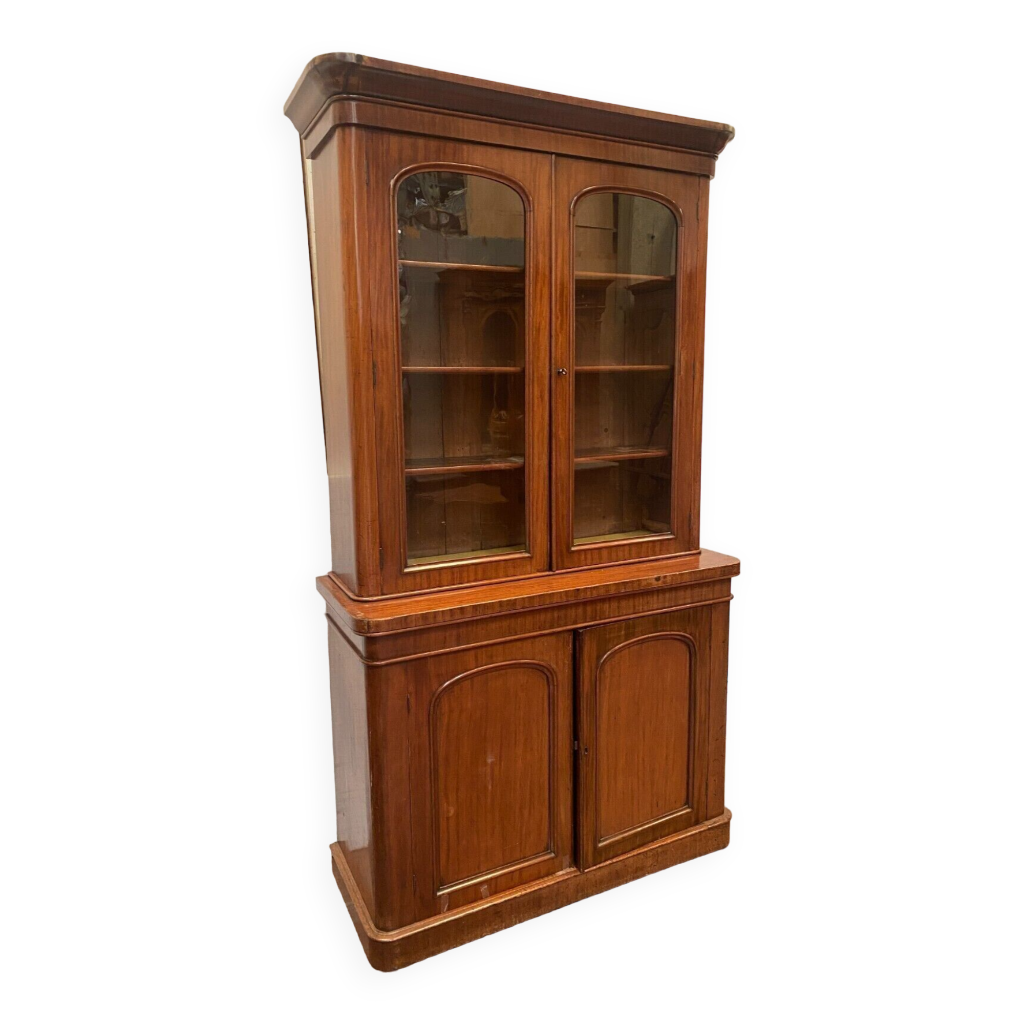 English showcase in two mahogany bodies and 19th century veneer