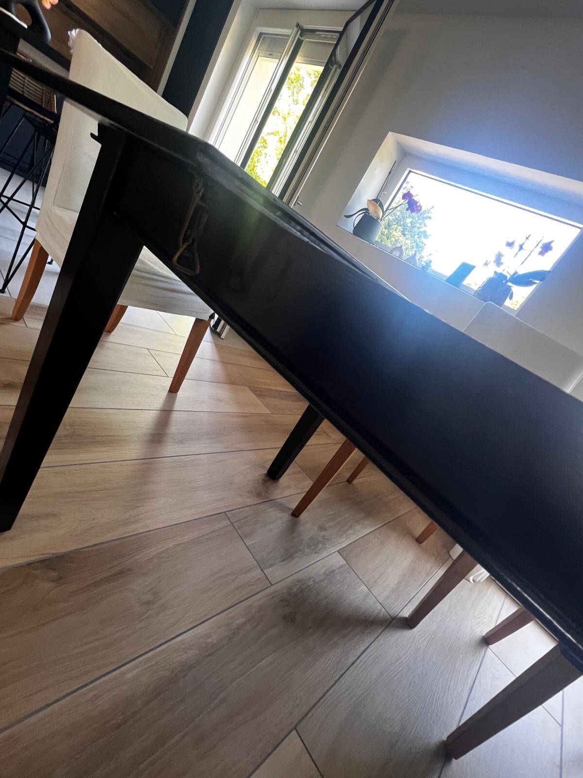 Solid cherry wood dining table, extendable for 8 to 12 people.