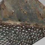 Perforated metal basket, hunchbacked jeans, 1940s