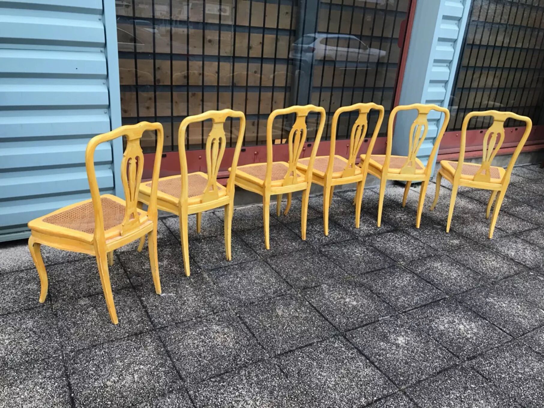 6 yellow canned chairs