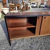Vintage sideboard with sliding doors from the 60s