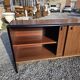 Vintage sideboard with sliding doors from the 60s
