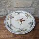 Vintage Longchamp plate handmade with bird and flower decoration, 25.5cm.