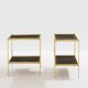 Pair of neoclassical side tables in brass and black leather by Maison Jansen, 1960.