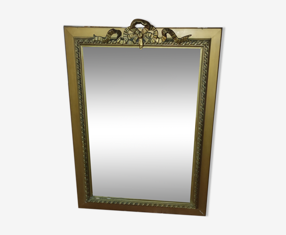 Miroir doré décor noeud 76x102cm