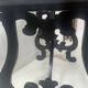 Blackened wood display table with marquetry top, Spain, 19th century.