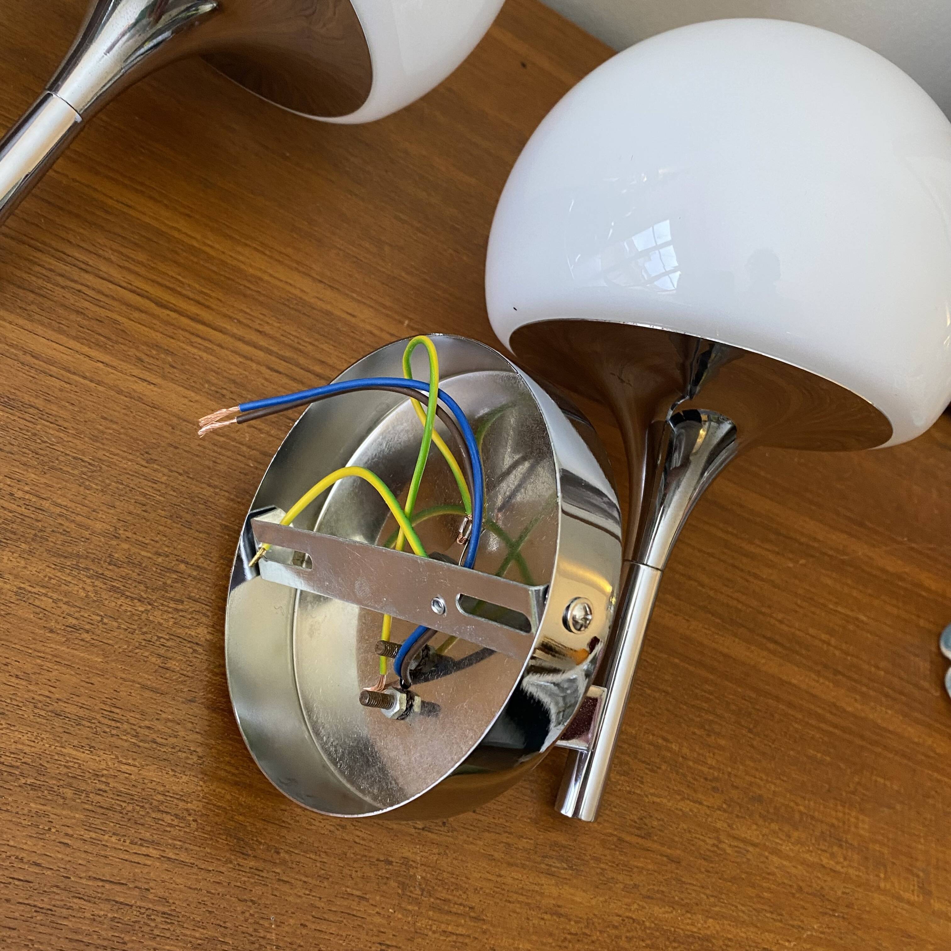 Pair of seventies wall sconces with chrome metal and opaline glass globe.