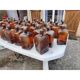 Set of 41 brown glass pharmacy bottles.