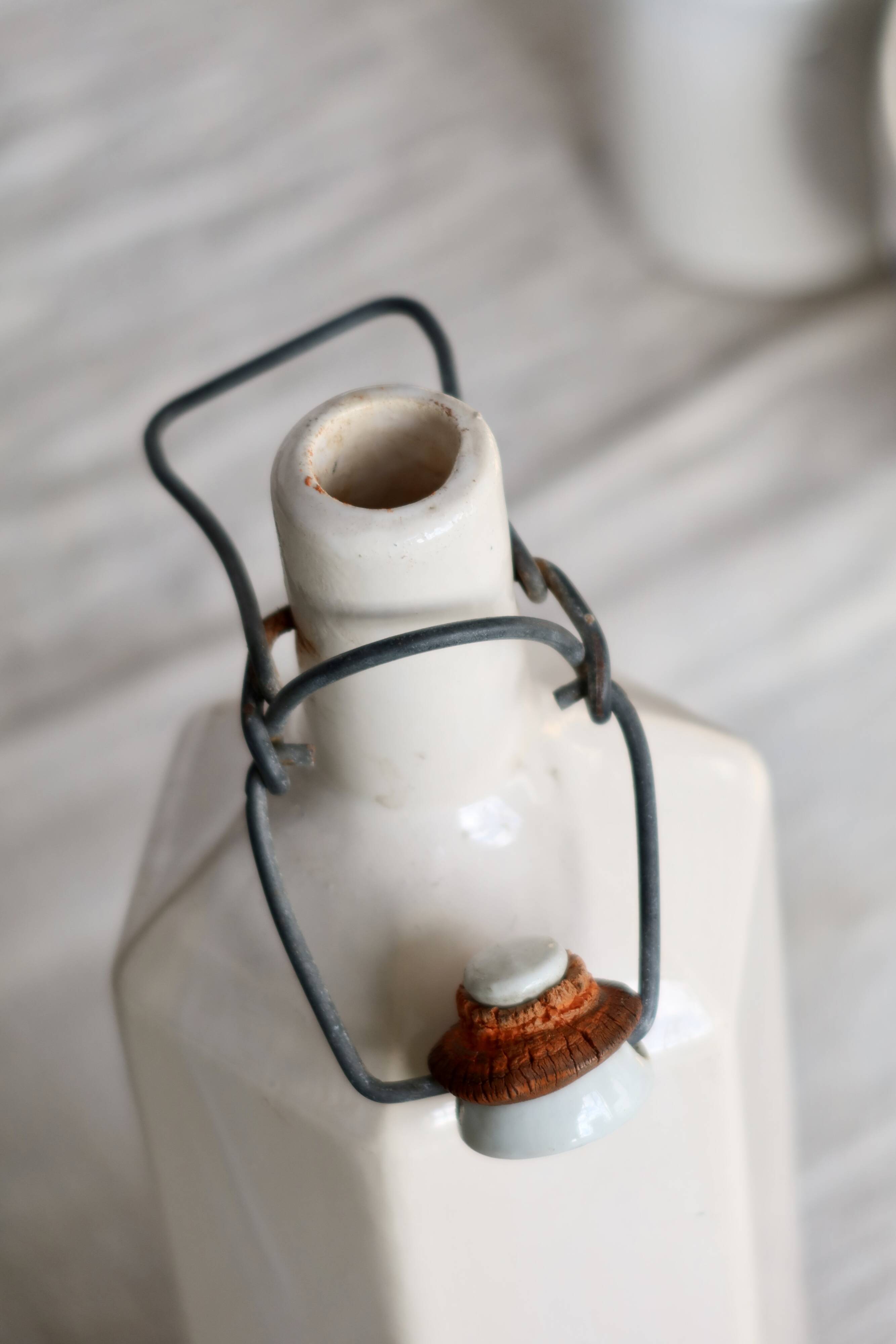 Antique beige glazed ceramic bottle