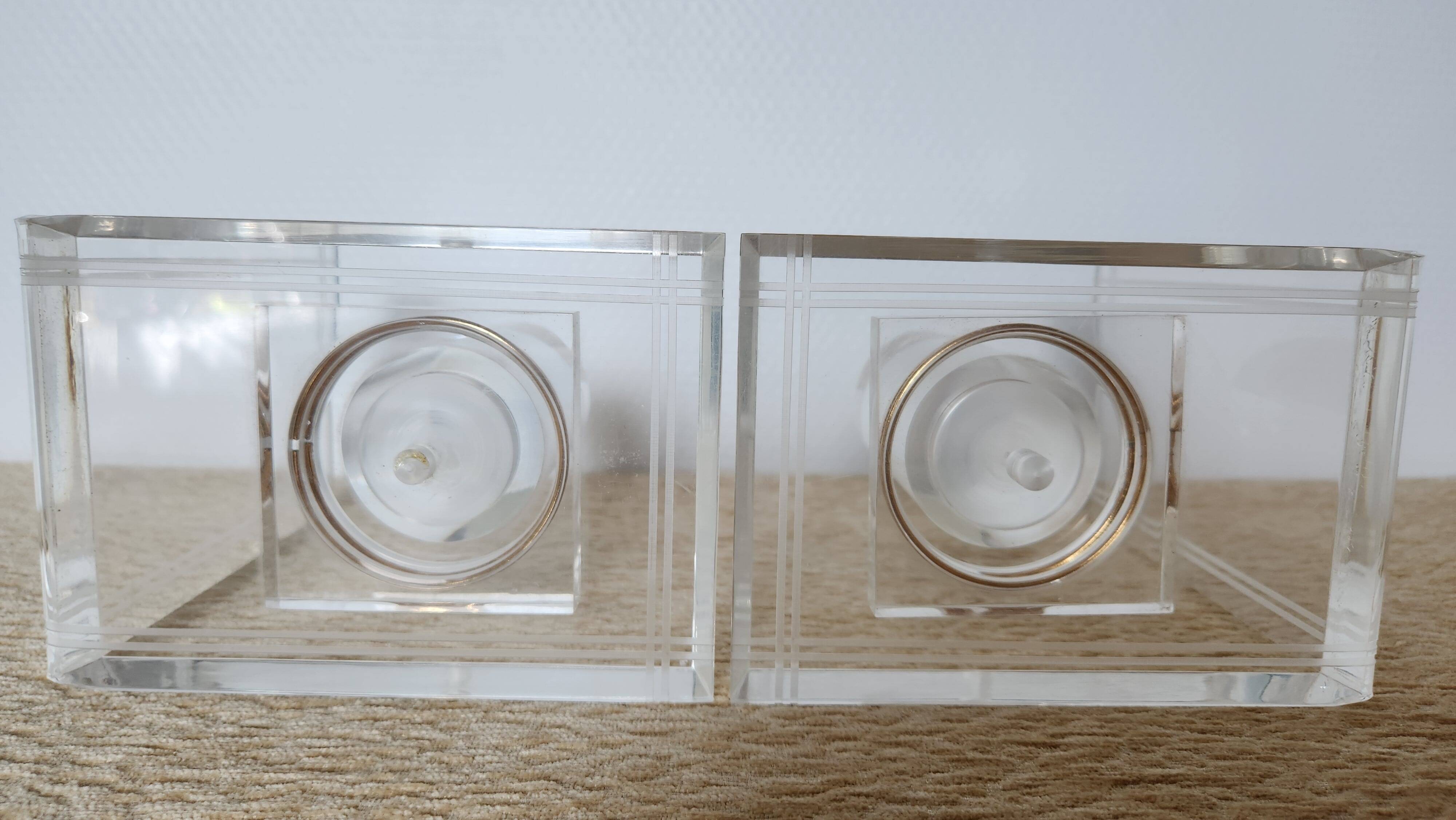 Pair of column bookends in plexiglass and gold metal, 1980s design.
