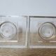 Pair of column bookends in plexiglass and gold metal, 1980s design.