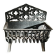 Fireplace grate with clover pattern