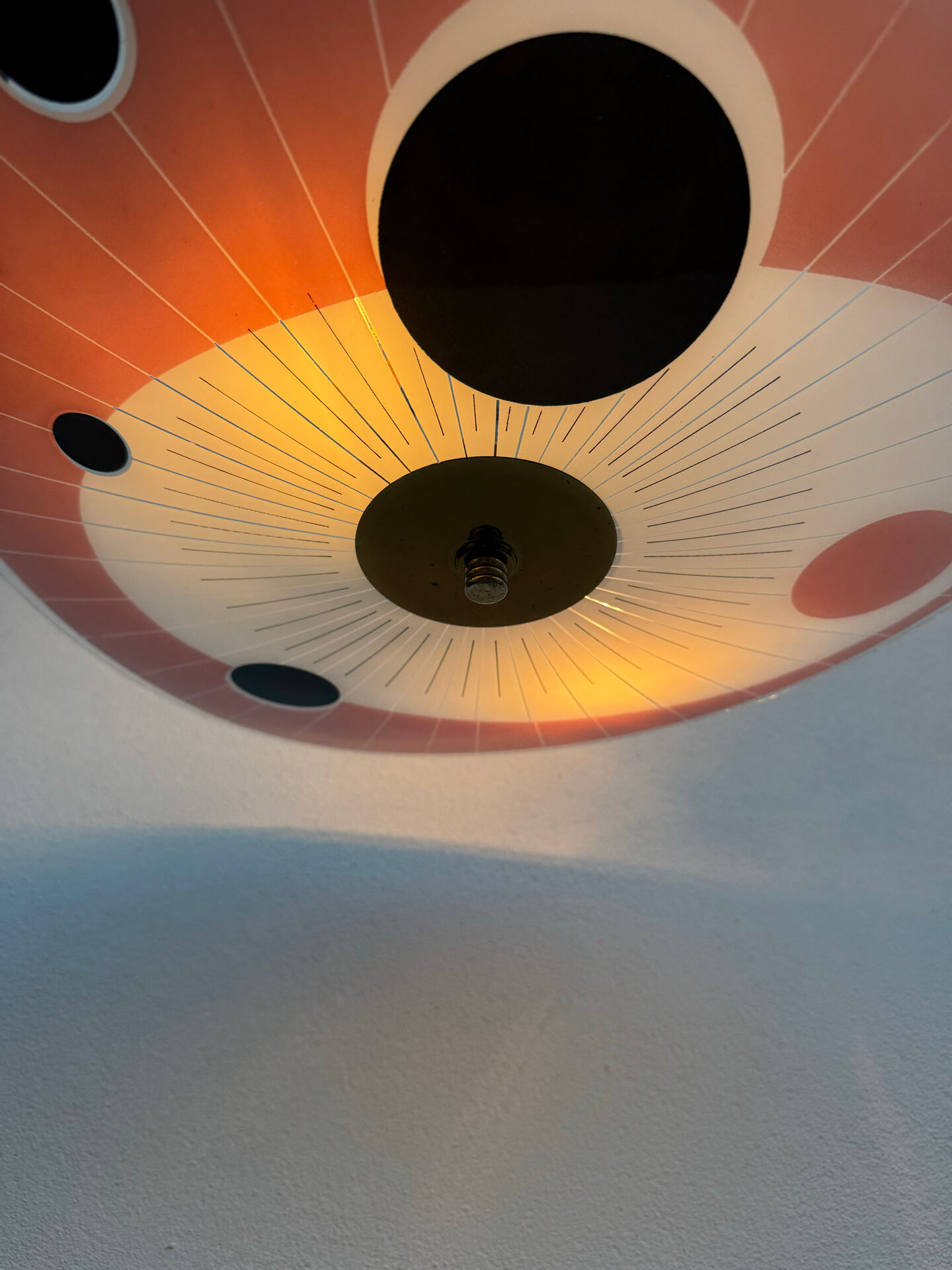 Screen-printed glass pendant from the 1960s