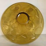Yellow glass cup with flower pattern