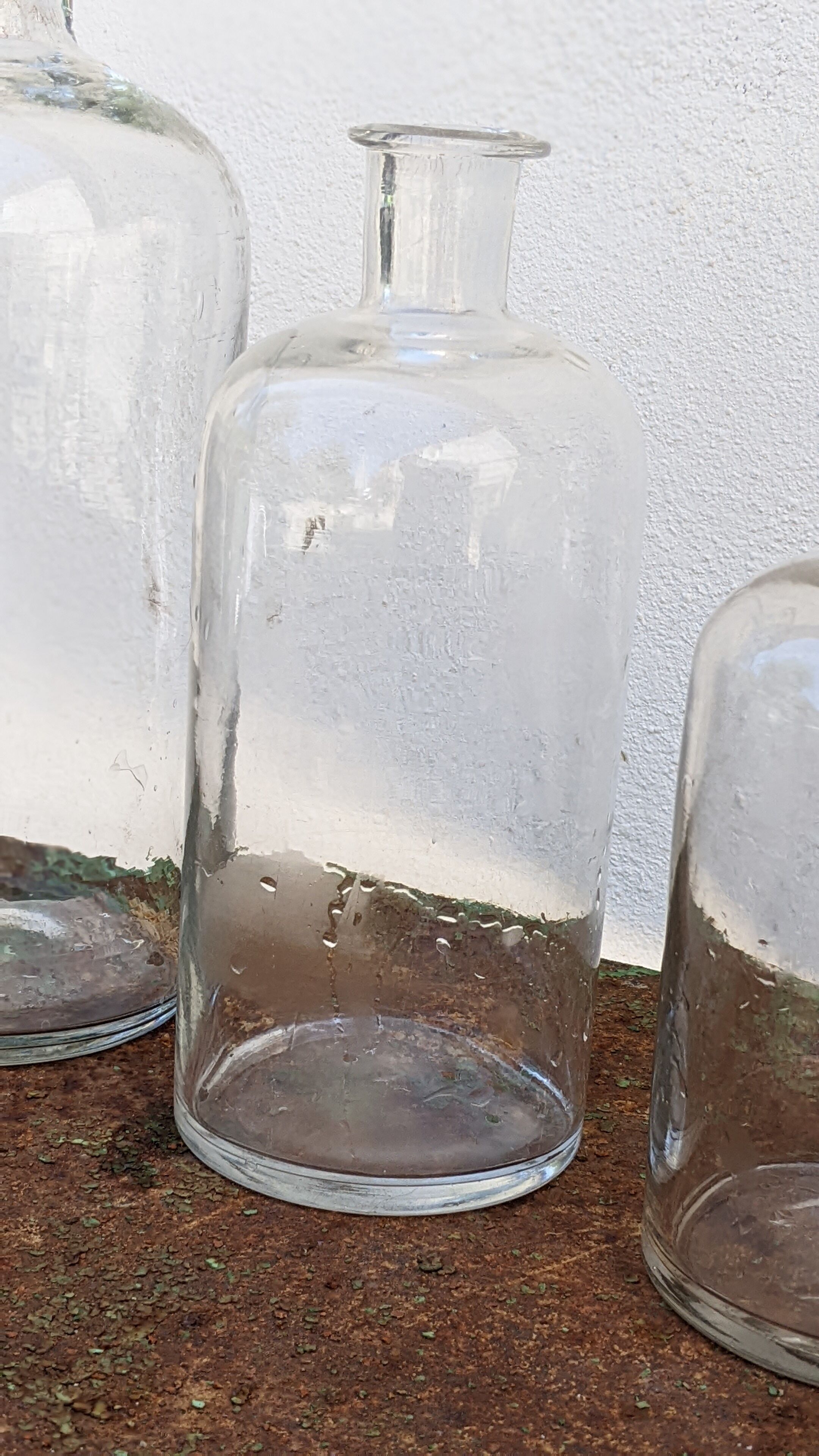 Series of 4 old bottles of herbalist