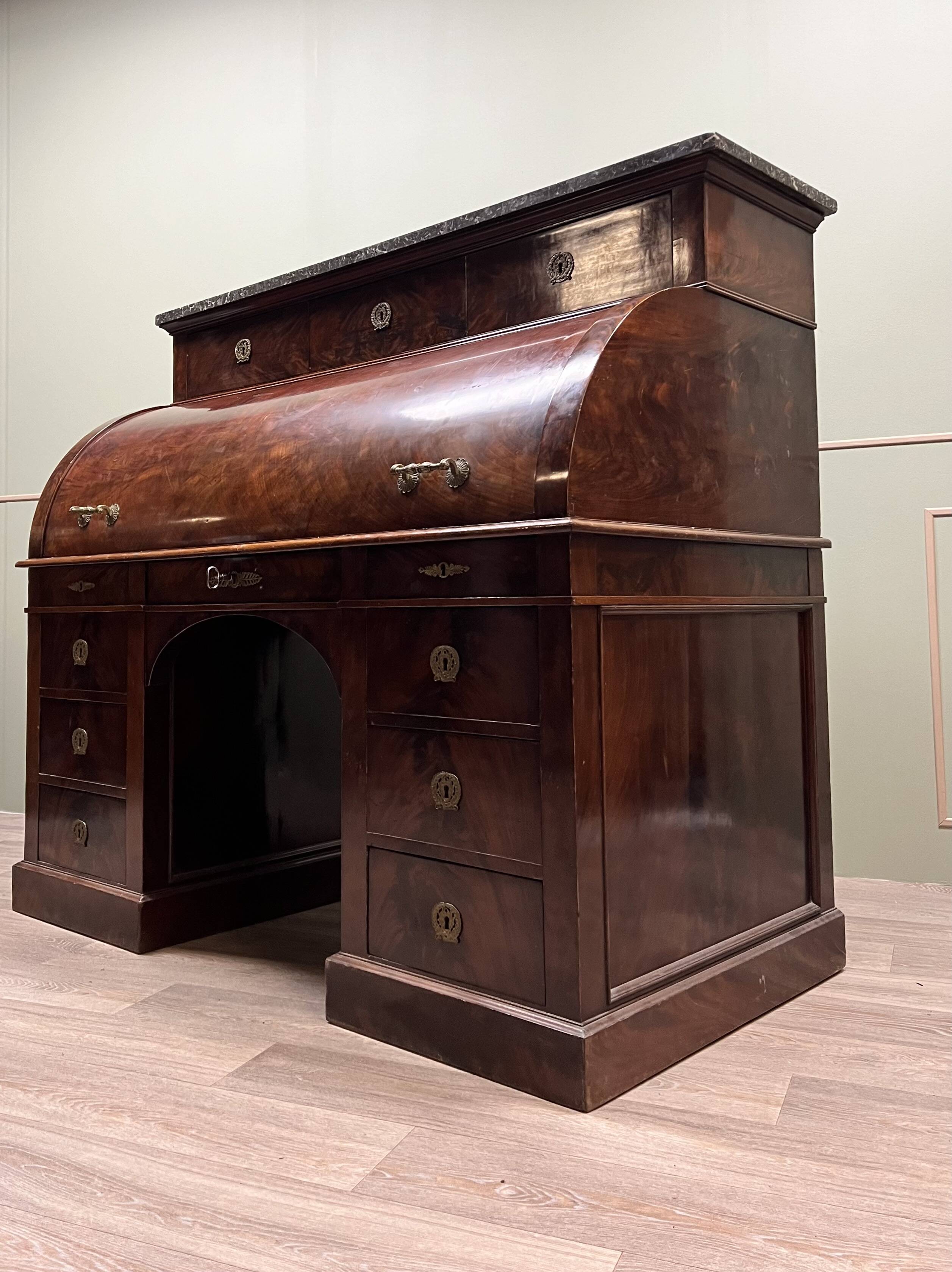 Cylinder desk in flamed mahogany empire style 19th century