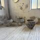 Trio of stone and cement planters, early 1900s