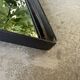 Miroir brutaliste losange en fer