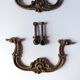 Antique pair of bronze drawer handles.