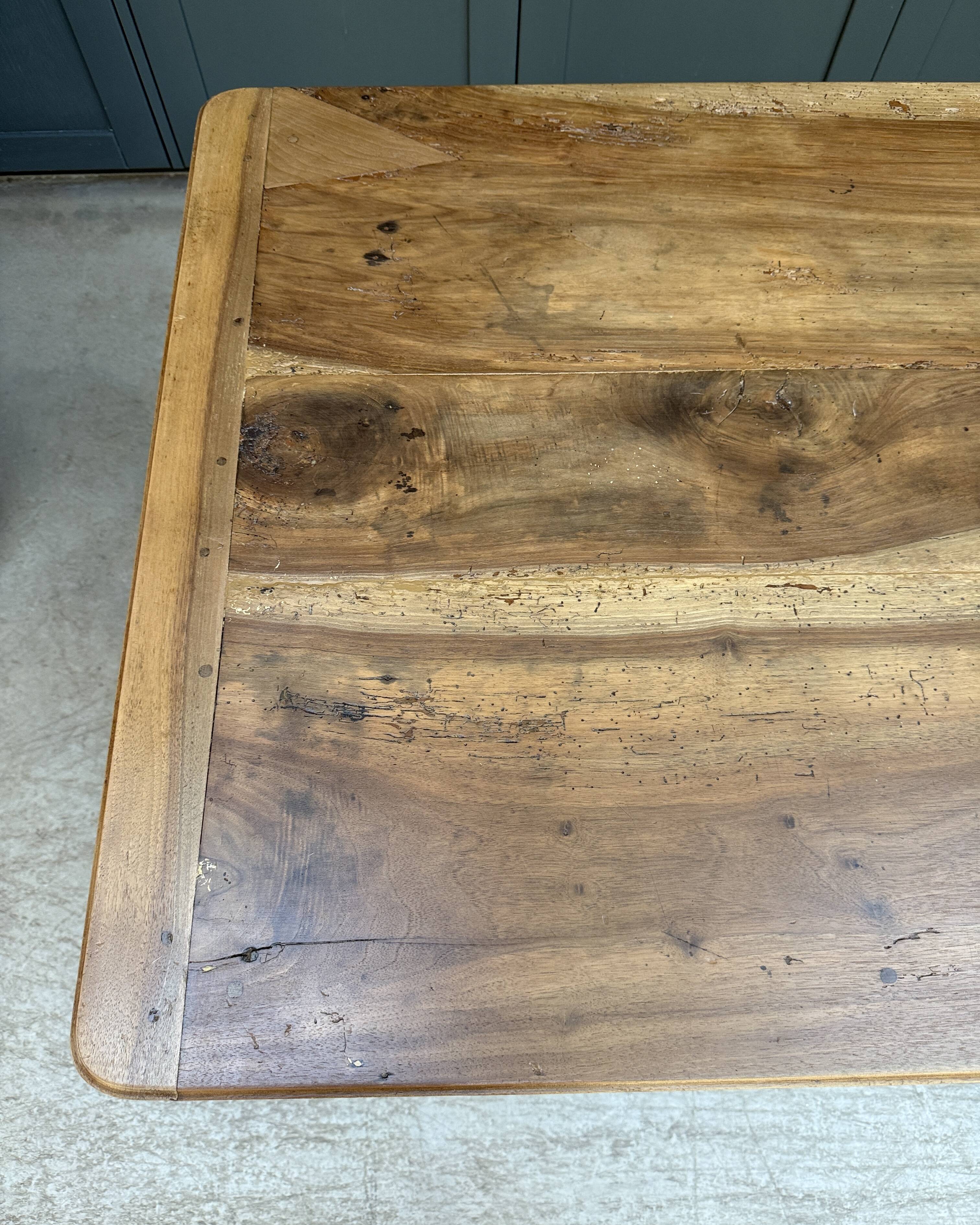 Renovated oak and walnut farmhouse table.