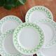 Set of 7 Badonviller flat plates, trellis decor