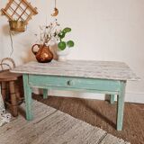 Wooden farmhouse coffee table green base