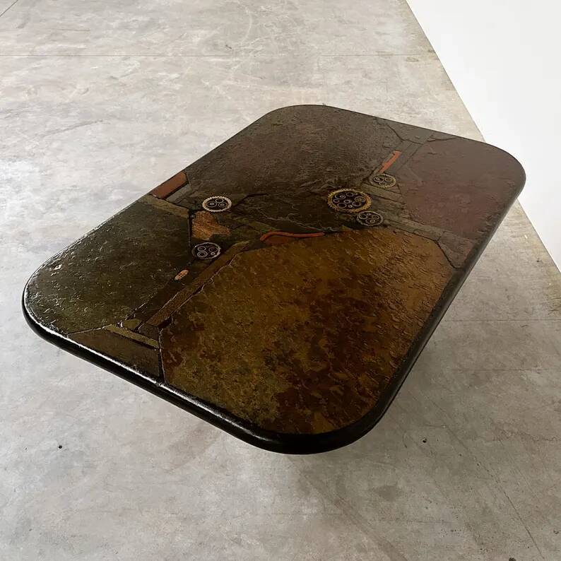 Brutalist coffee table in mixed media by Kneip, signed 1993