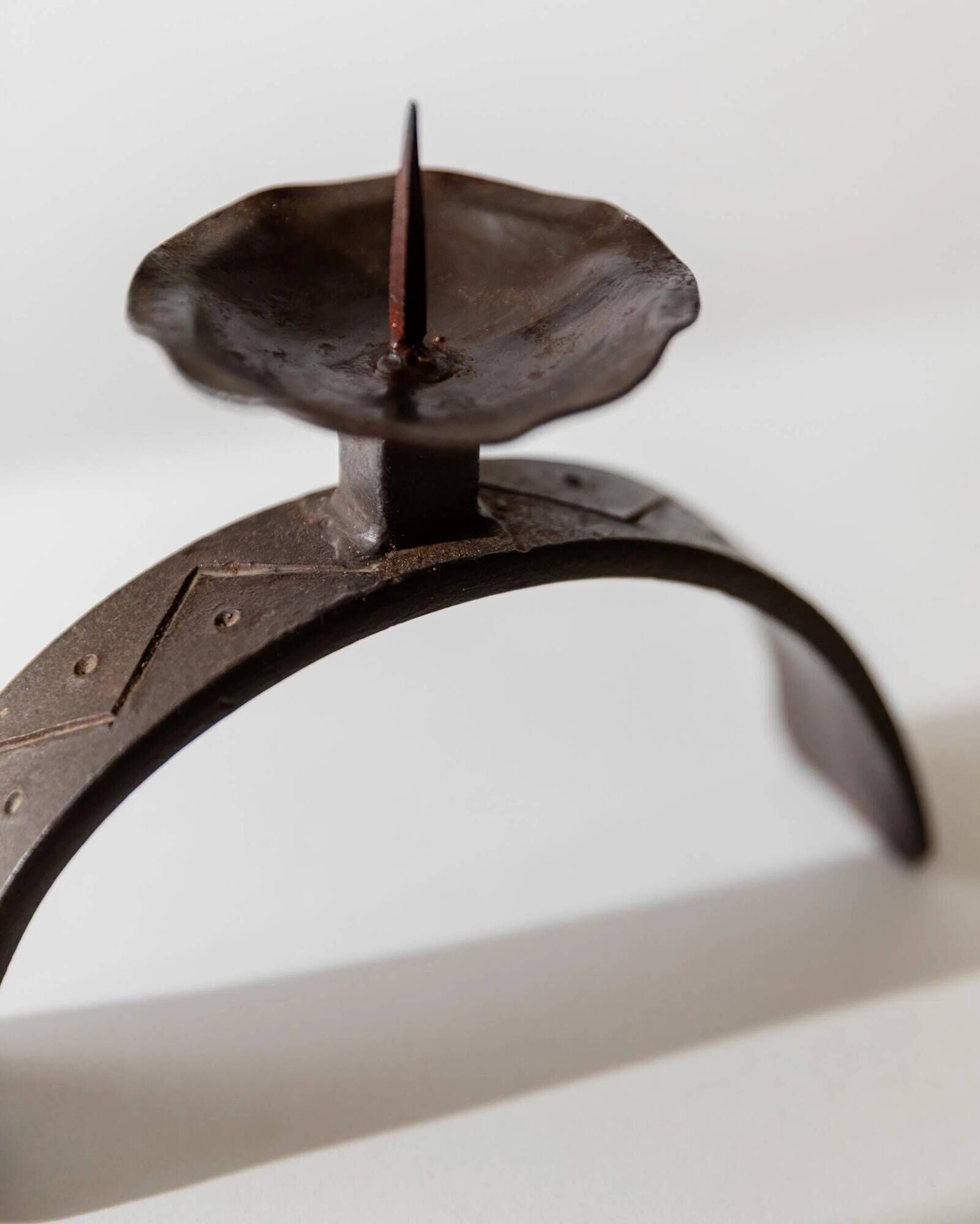 Vintage wrought iron candlestick from the 1960s, sculptural relief pattern for pillar candle, rustic Mid-Century metal, elegant gift idea.