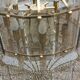 70s designer chandelier with smoked glass plates and gold metal frame