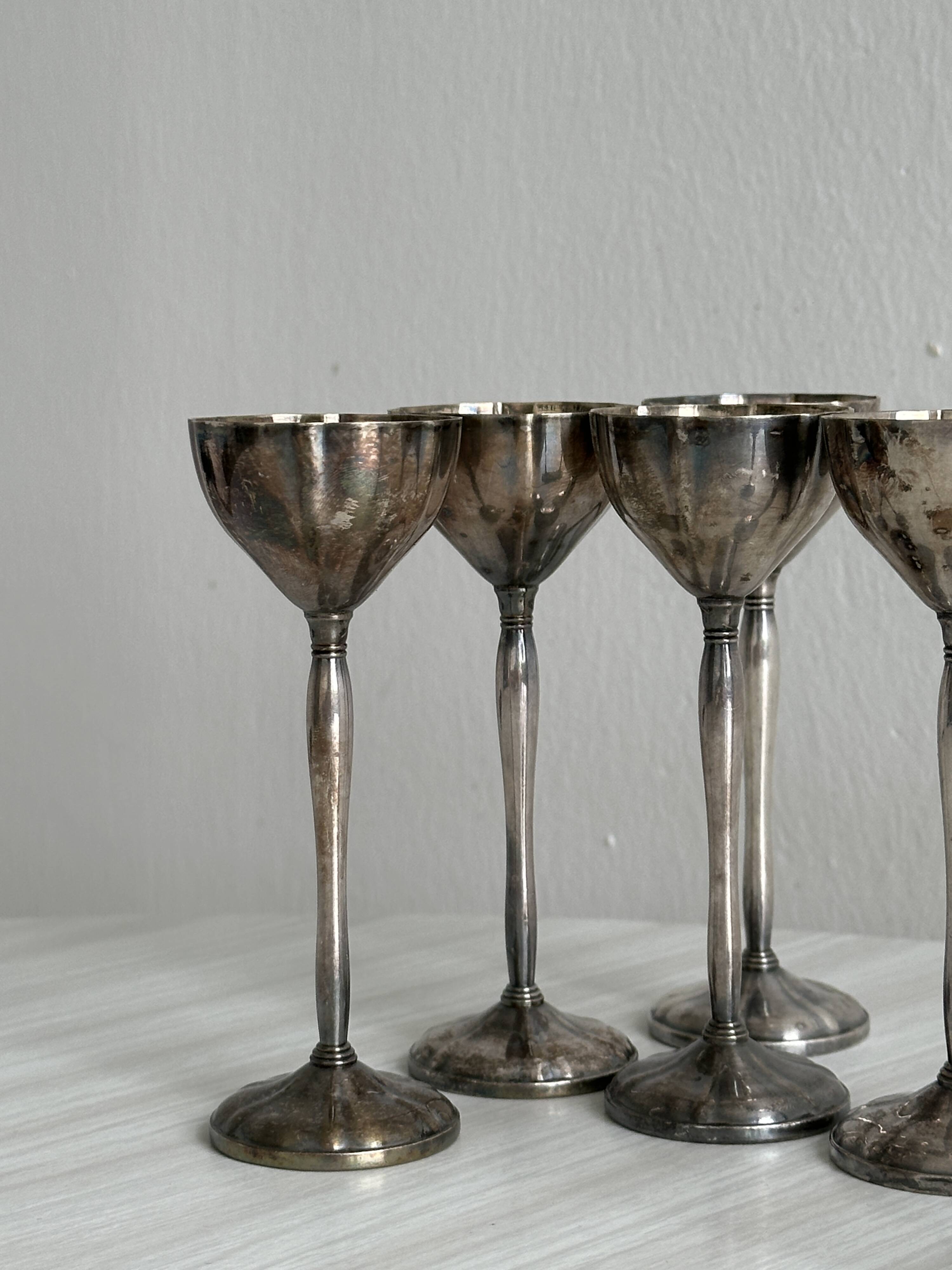 Set of 6 antique egg cups in patinated metal