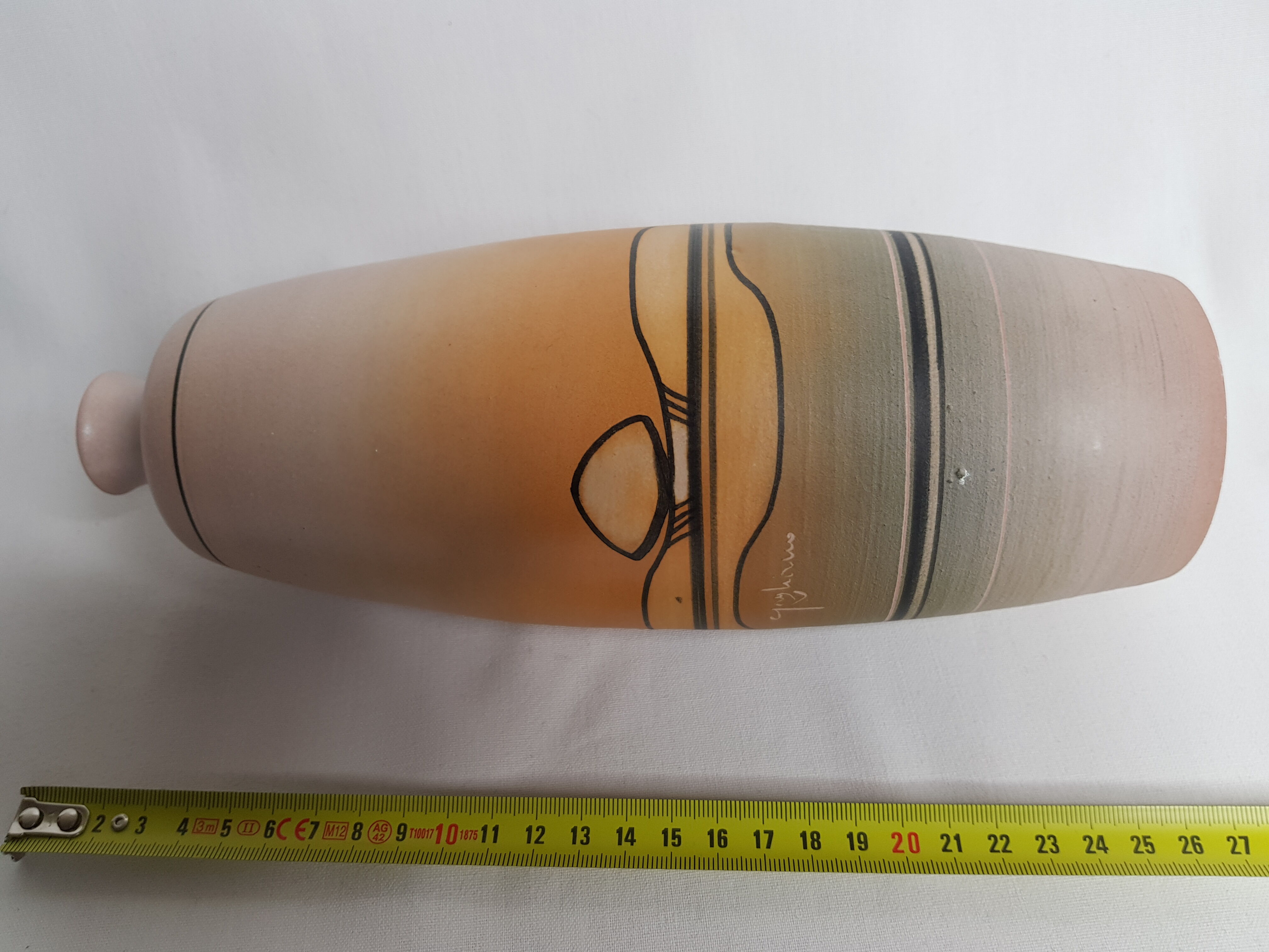 Vintage vase in ochre tones by Guy Hano
