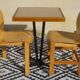 Pair of light wood chairs with post-formed seat and backrest.