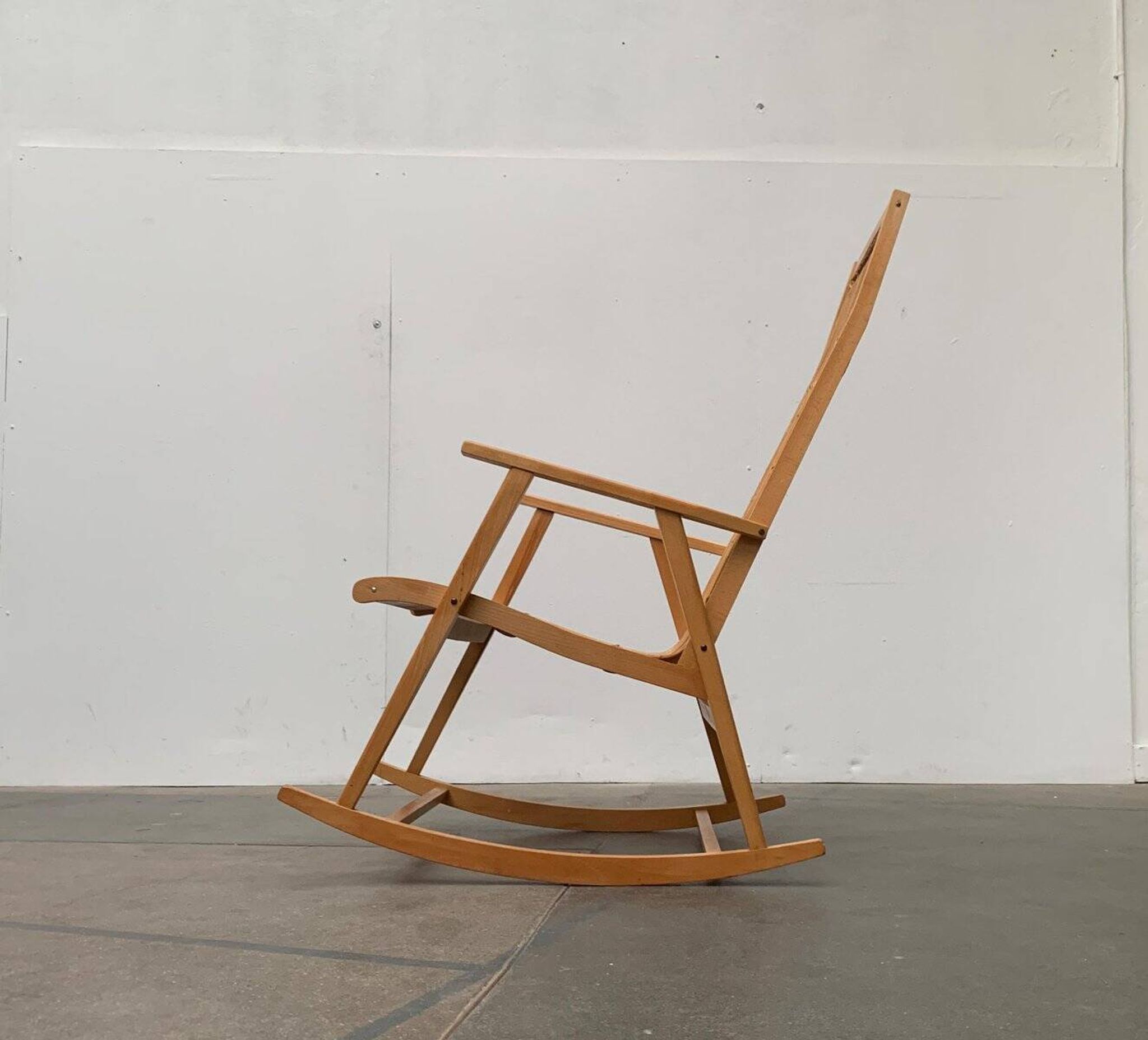 Mid-century German rattan rocking chair from Deutschen Werkstätten Hellerau, 1960s.