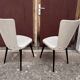 Pair of Chairs Baumann model Essor in imitation white leather, beech compass base