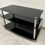 Modern chest of drawers with stainless steel and smoked glass