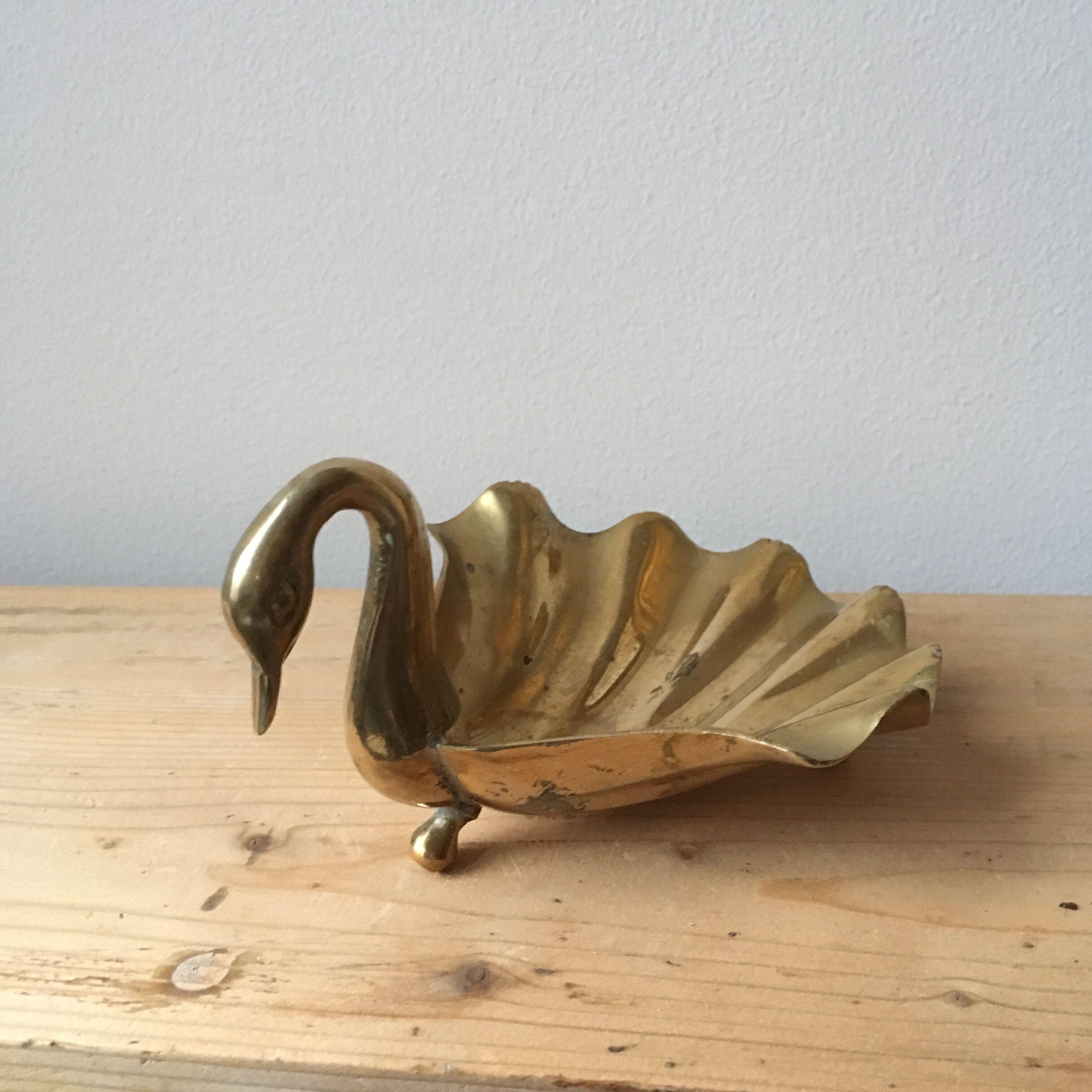 Empty Pocket Swan brass on foot