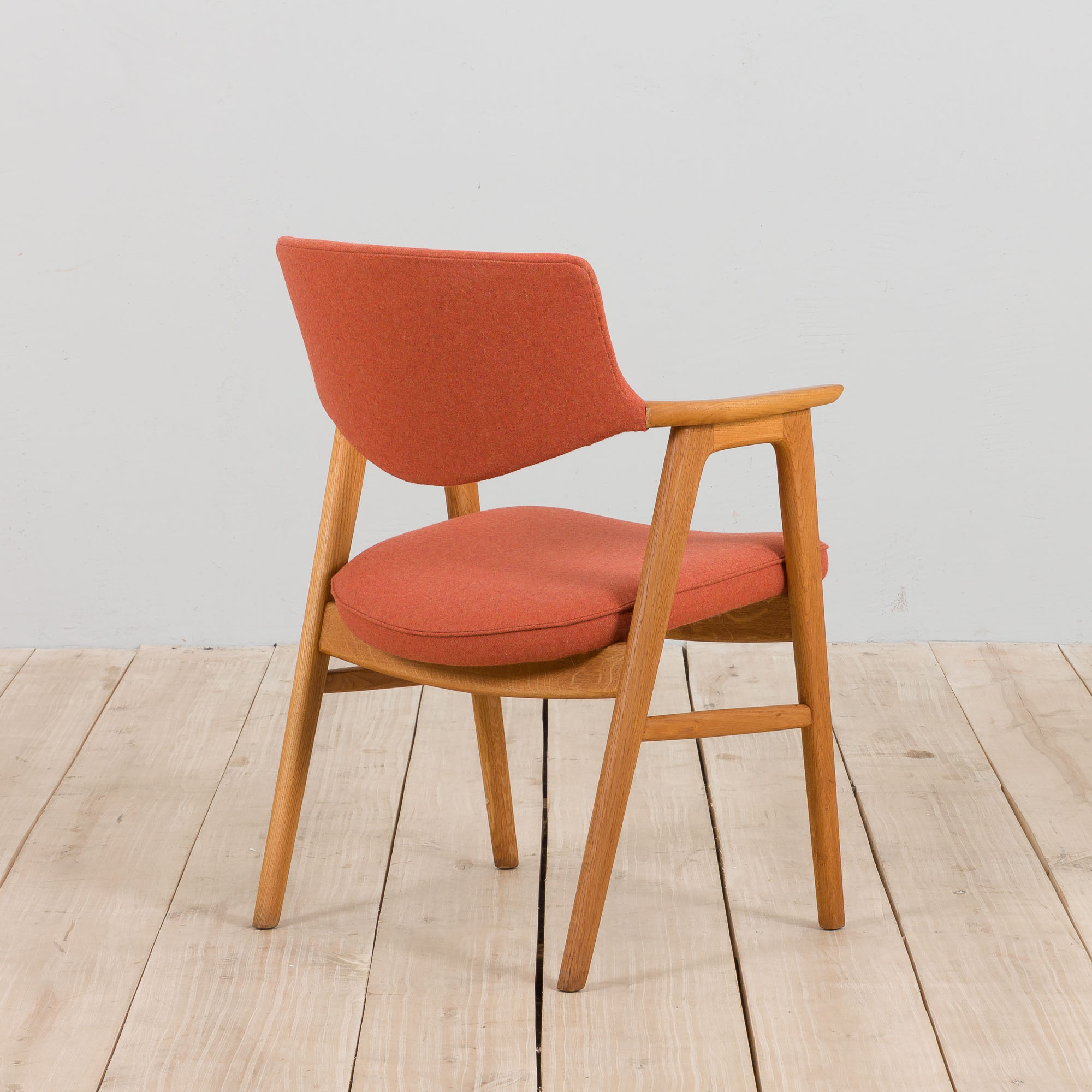 Erik Kirkegaard Oak desk chair in new pale red  wool upholstery.